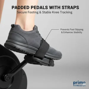 Close-up of wide, padded pedals with secure straps to prevent foot slipping and ensure stable knee tracking during exercise.