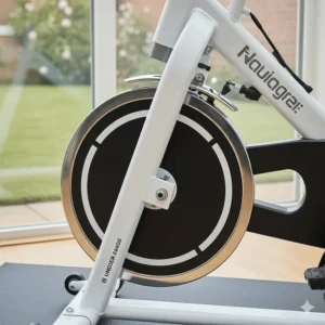 Close-up of a spin bike flywheel and frame, highlighting high build quality and value for British consumers at a price point under £400.