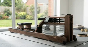 An oak-finish water resistance rowing machine shown as a stylish and cheaper alternative to the Concept2 Model D in a contemporary UK home.