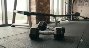 Hexagonal studio dumbbells for gyms preventing roll during high-intensity fitness classes